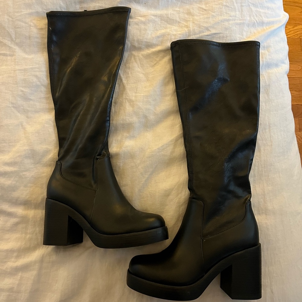 Tall black boots